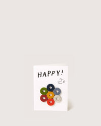 The graf lantz Wine Marker Note Card features HAPPY! with colorful rings and a whimsical bear sketch. Its a charming host gift that elevates any occasion with its plain background, radiating warmth and charm.