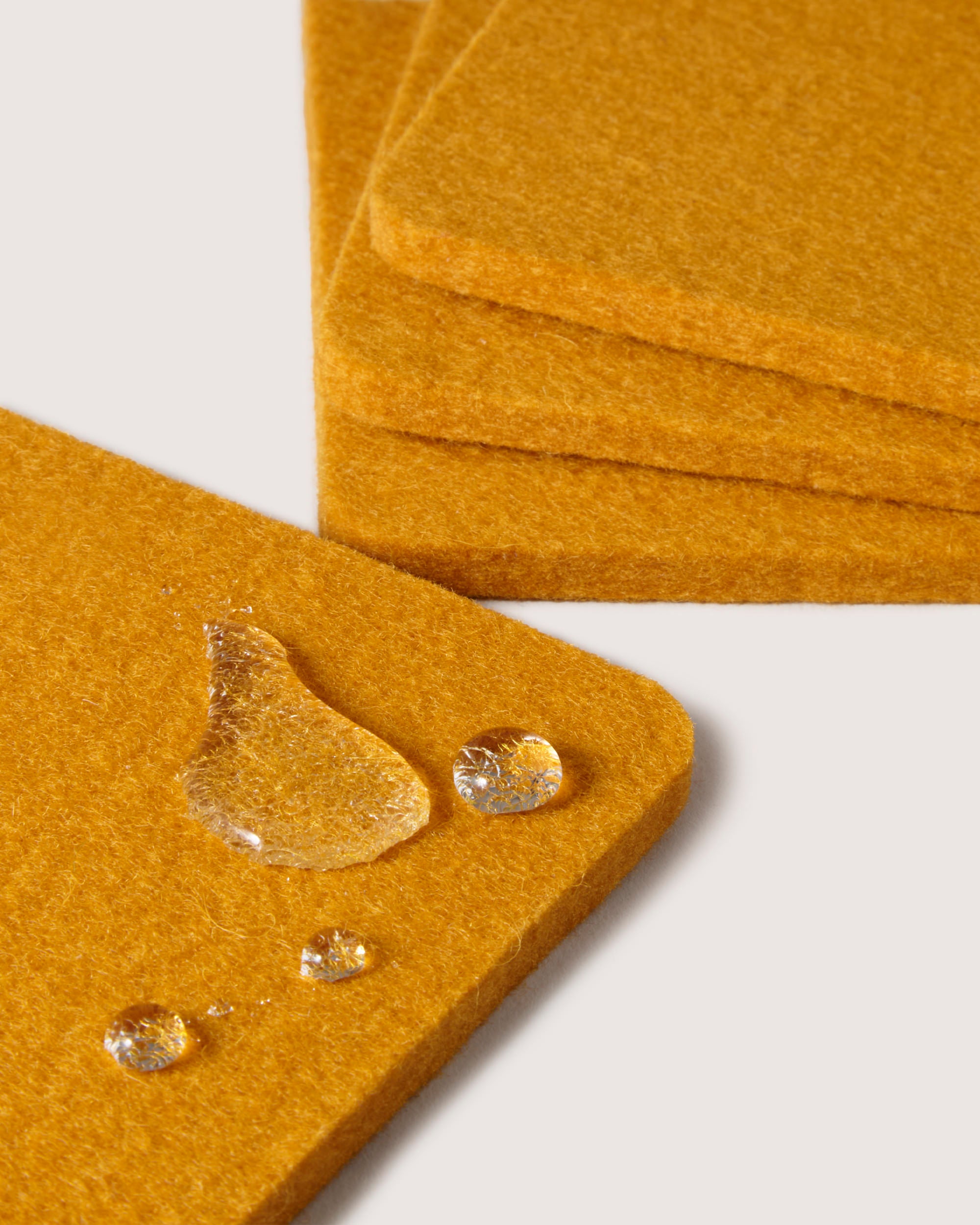 Kobon Leather/Merino Wool Square Tray 4 Pack Coaster Set