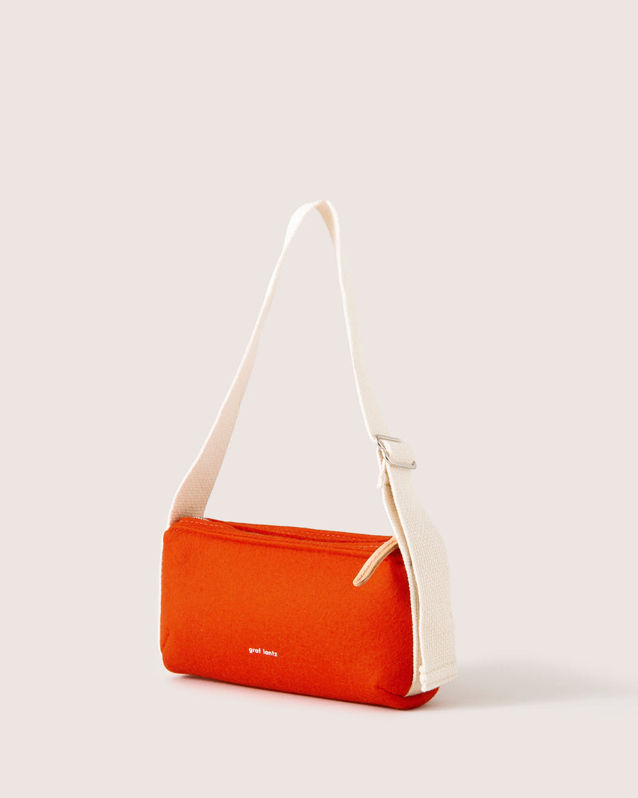 Casual enough for day, sleek enough for night and the adjustable strap lets it fit no matter what the look: our  Campus Shoulder Bag, here in orange