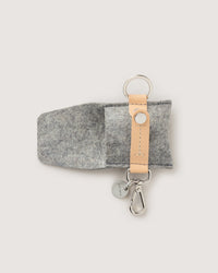 The Pod Fob holds your keys and pods. Here in granite color