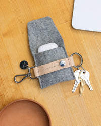 The Pod Fob holds your keys and pods. Here in granite color