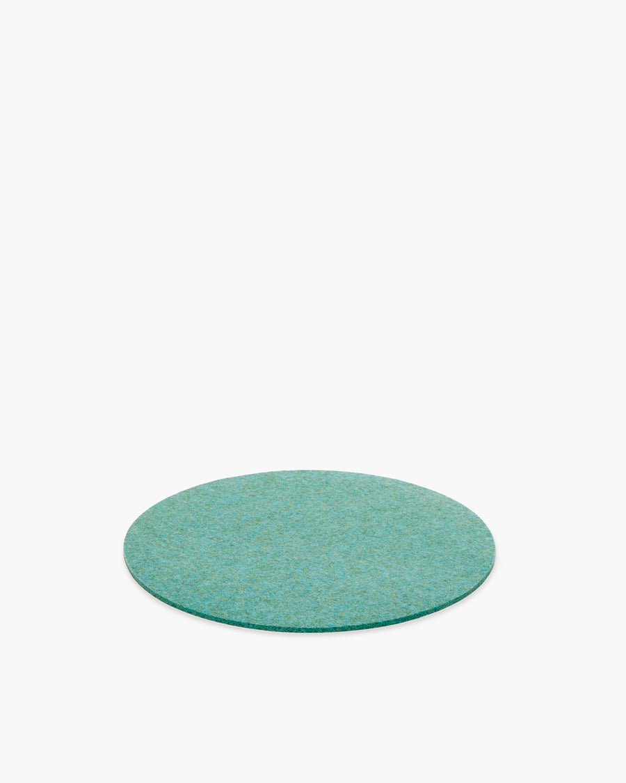 12" round Merino wool felt placemat in a coastal color