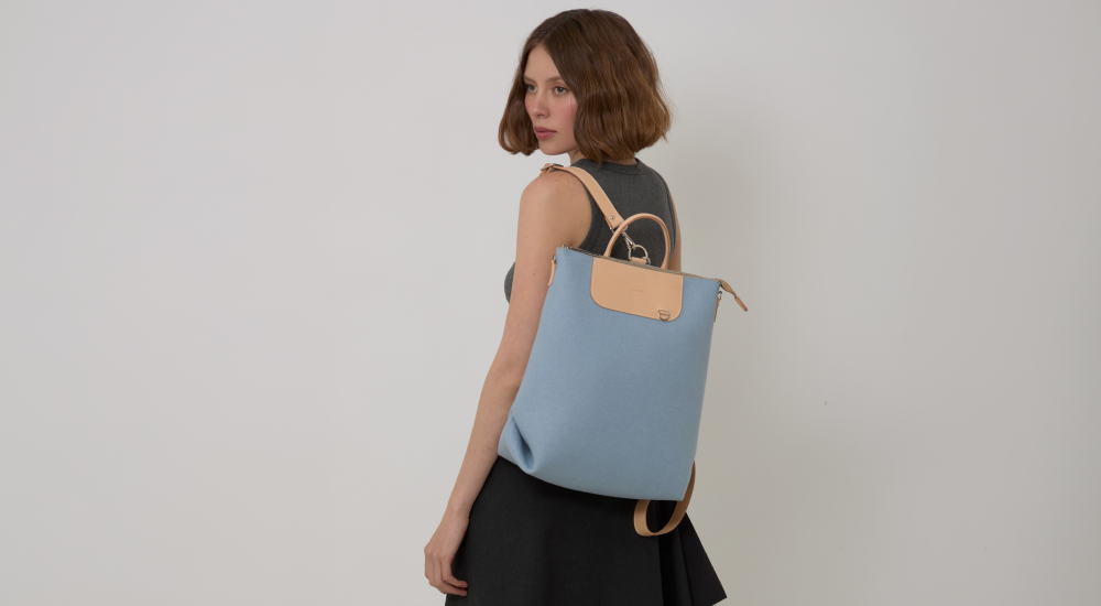Person wearing a Graf Lantz wool tote bag over the shoulder