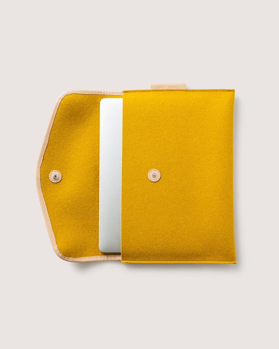 Our 14 inch laptop sleeve. Here in dijon color.