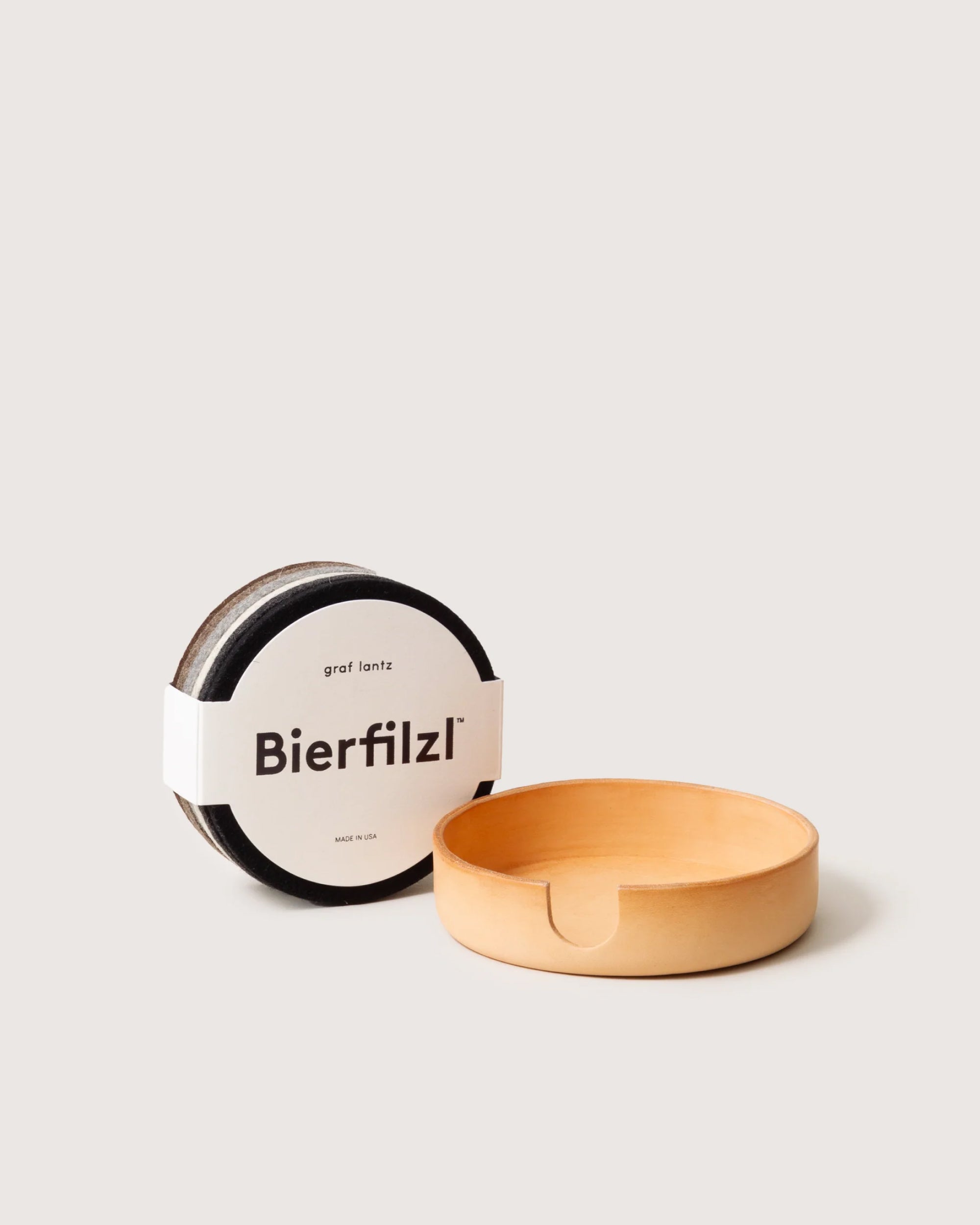 コースター セットBGO MMF INAVANCE TRUNK SIX Kobon Round Leather Tray 6 Pack Coaster Set in Earth | Graf Lantz