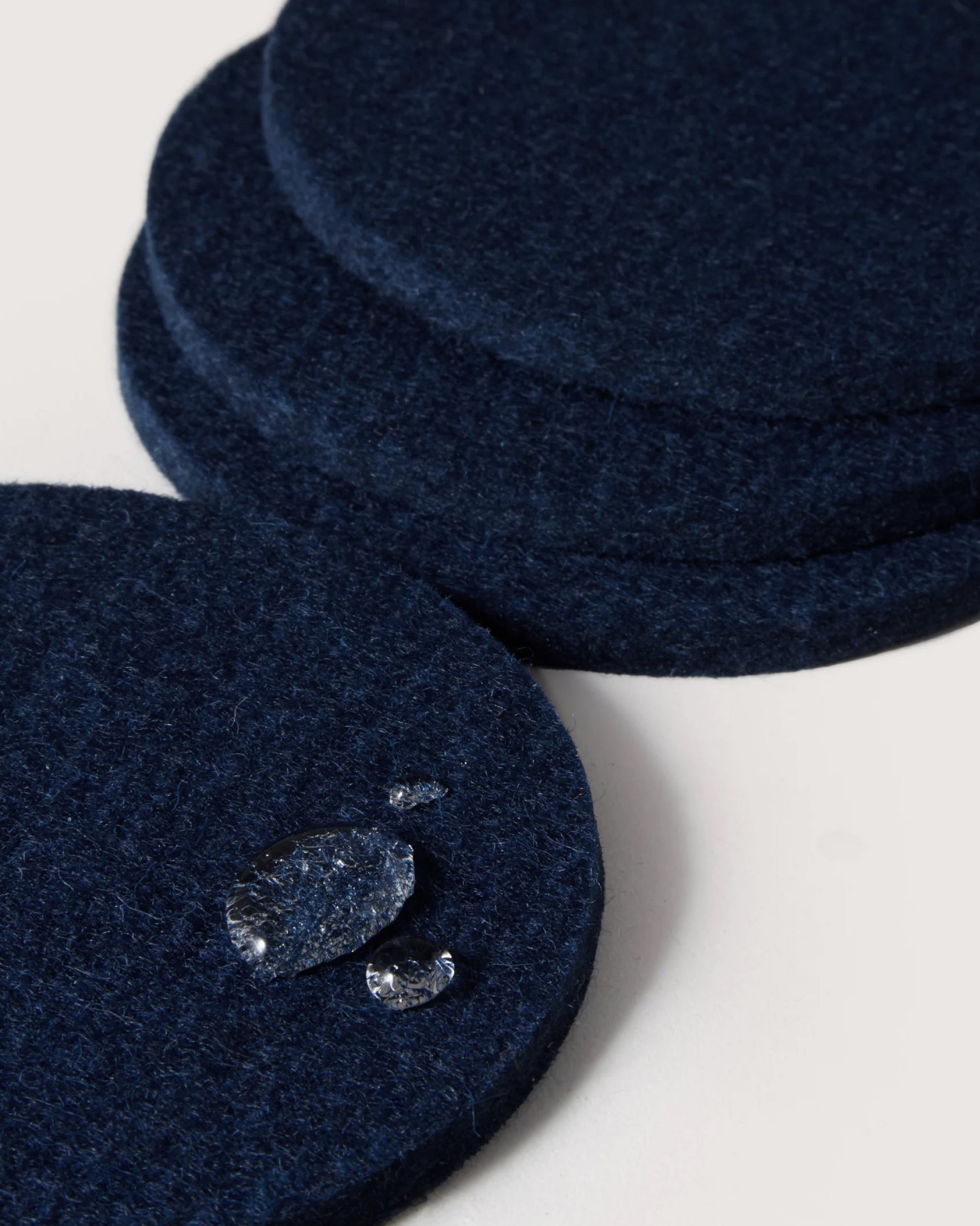 Kobon Leather/Merino Wool Round Tray 4 Pack Coaster Set