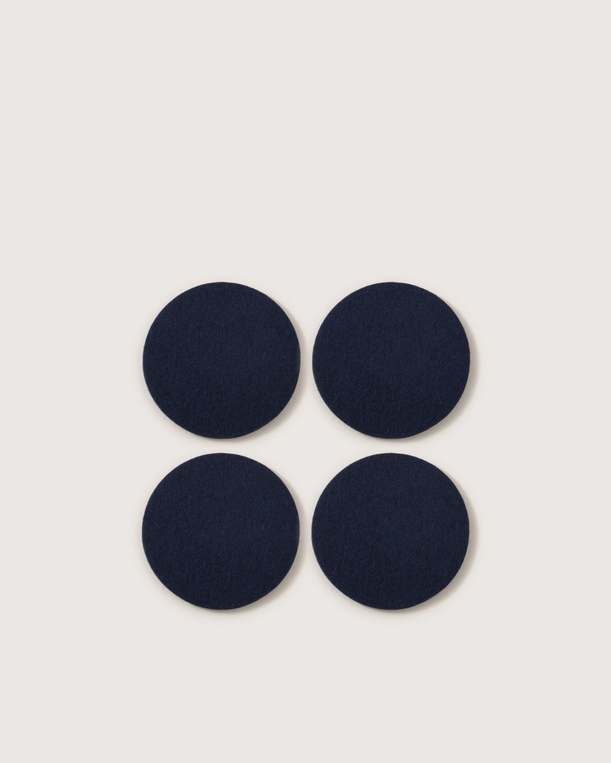 Kobon Leather/Merino Wool Round Tray 4 Pack Coaster Set