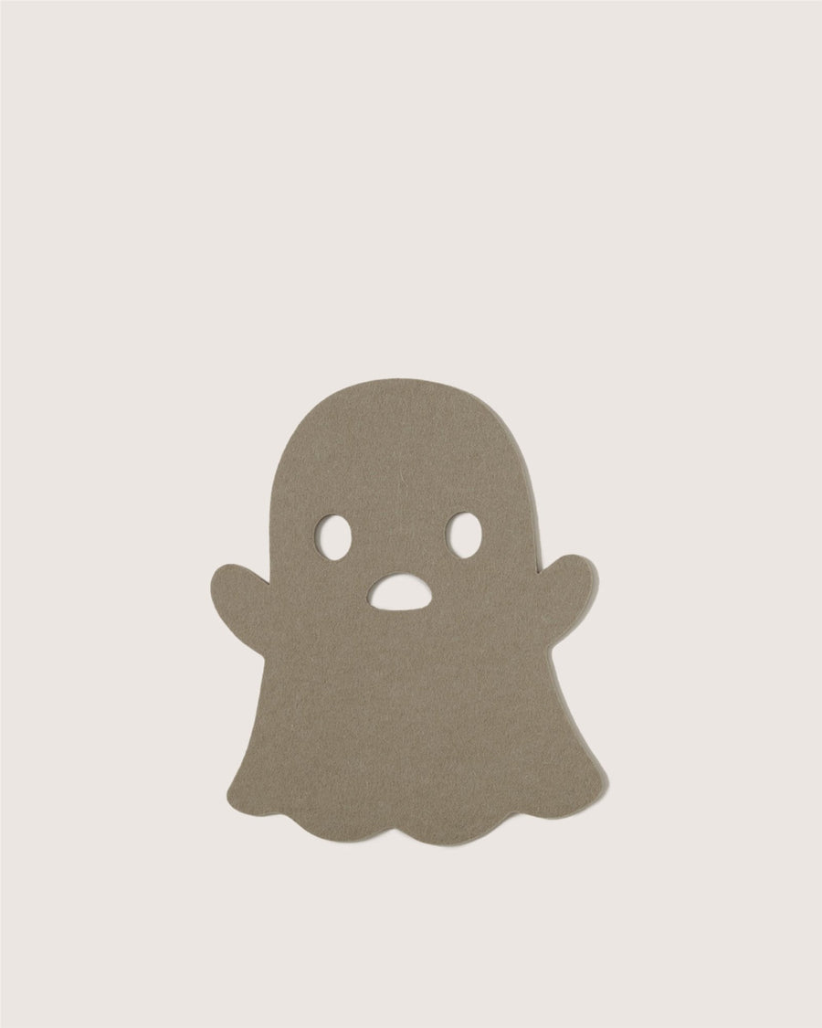A simple, flat gray ghost cutout by Graf Lantz features two round eyes and an open mouth, displayed on a plain off-white background.