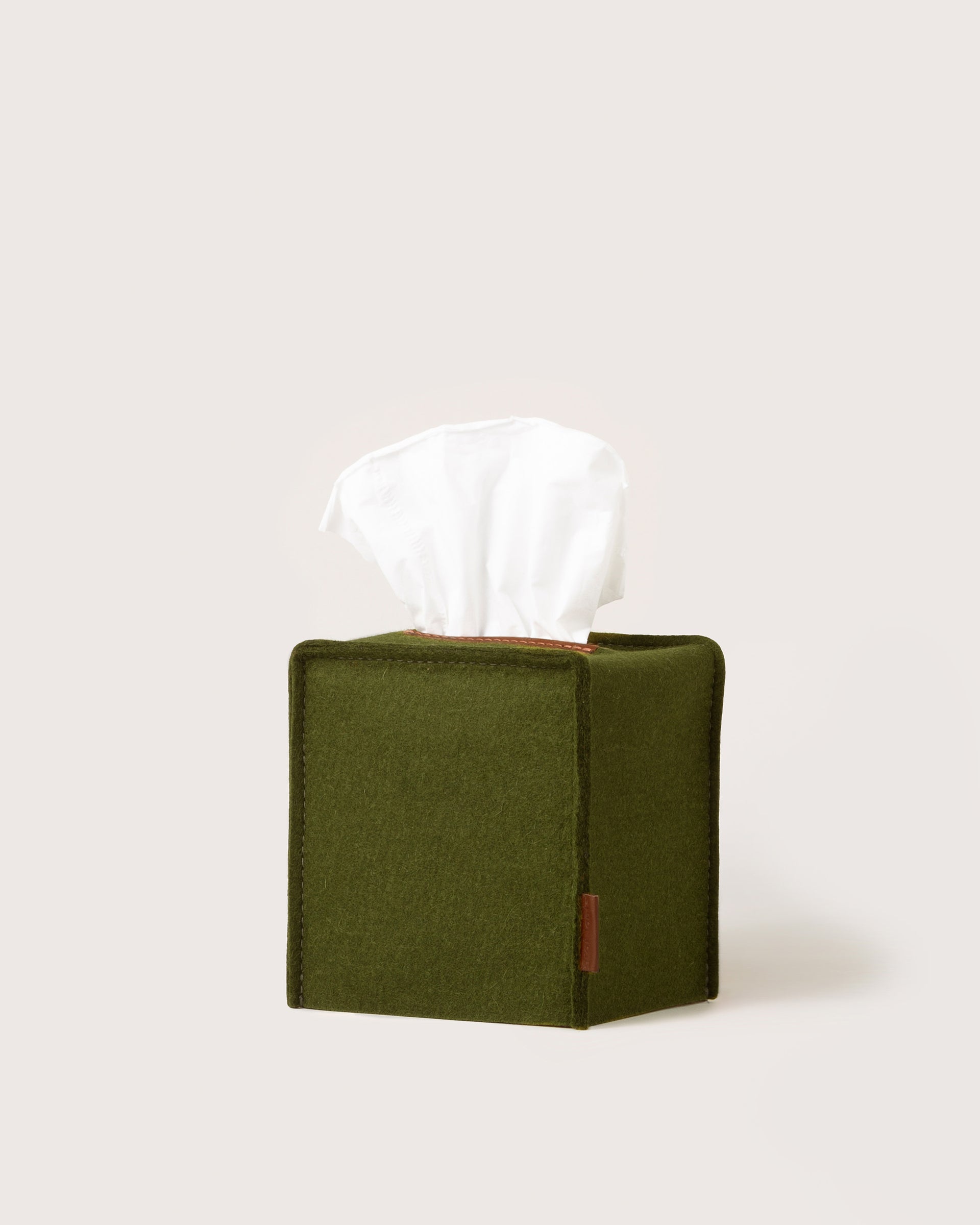 A square Merino Wool Felt Tissue Box Cover in color Moss Sienna by Graf Lantz, white background