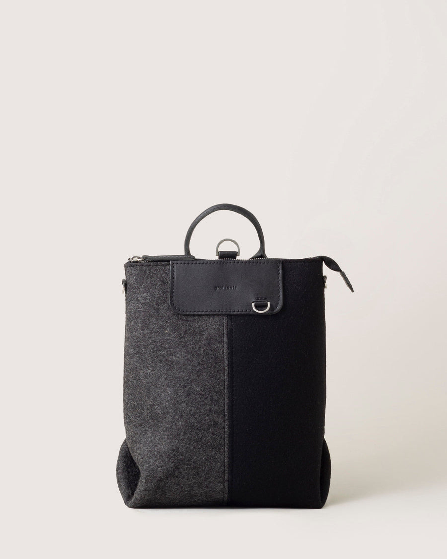 Charcoal and Black colored Bedford Merino Wool Colorblock Midi Backpack, front view, white background