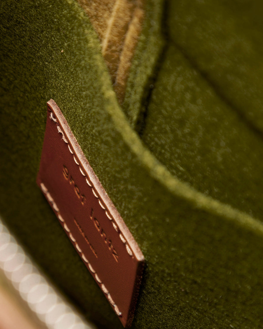 Interior view of Bedford Merino Wool Colorblock Midi Backpack in Moss and Ochre