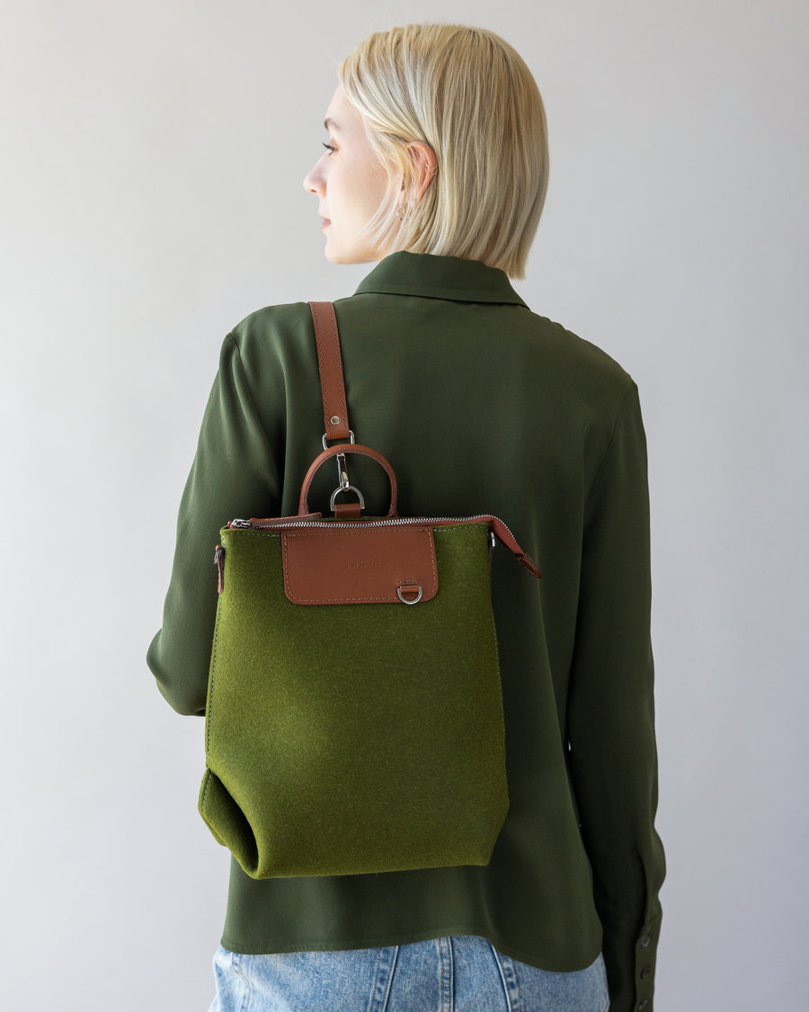 Woman with green Green Bedford Merino Wool Midi Back on her back, rear view, white background