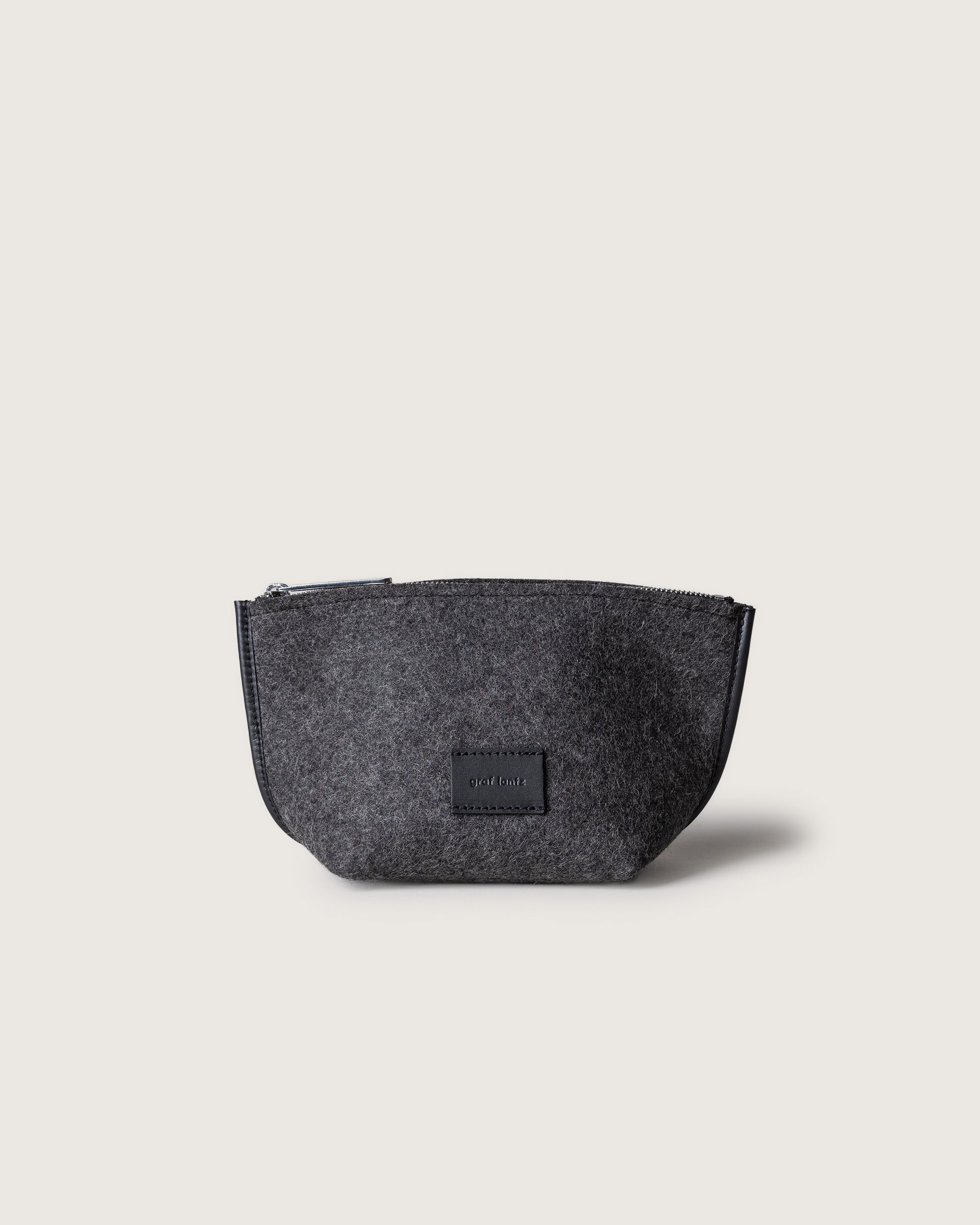 Hana Merino Wool Pouch in charcoal by Graf Lantz, front view, white background