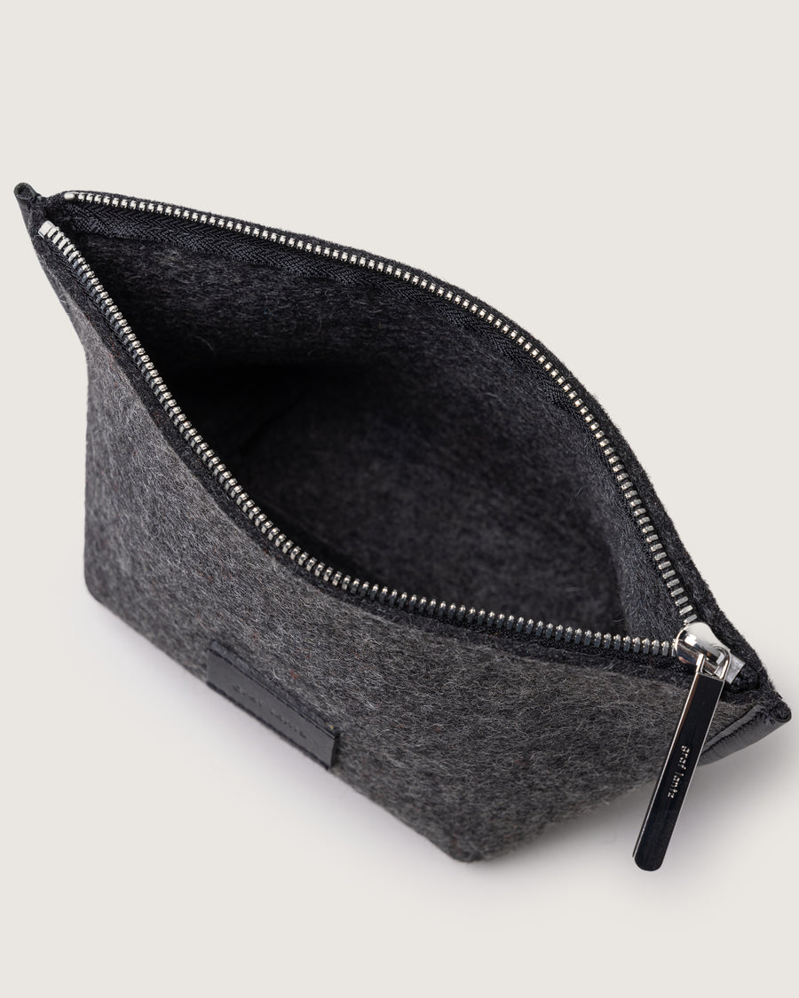 Interior view with open zipper: Hana Merino Wool Pouch in charcoal 