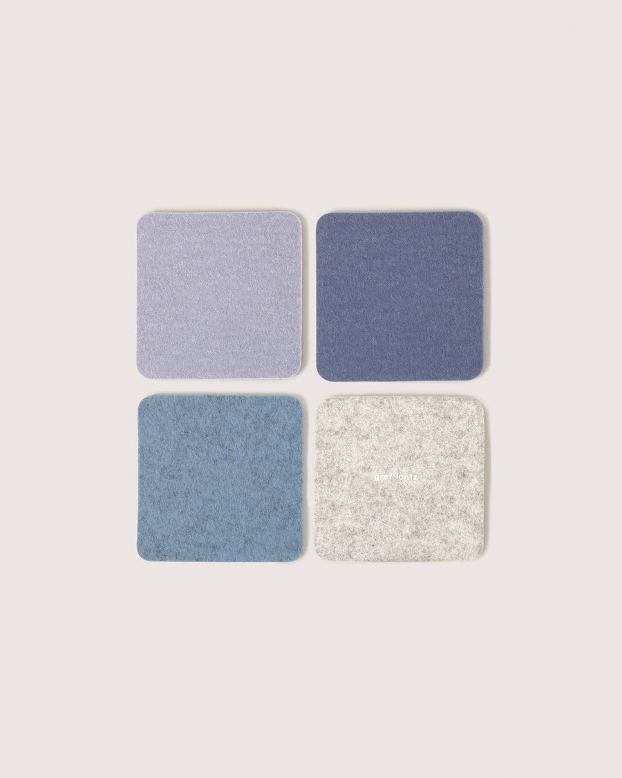 Bierfilzl Merino Wool Square Coaster Multi 4 Pack in Heather Blue, Horizon, Fog and Heather White, white background