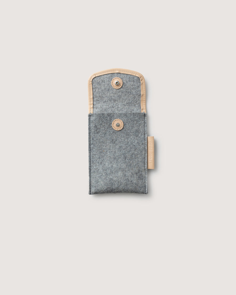 Protect your phone or other small items with our Envelope Accessory Sleeve. Here in granite color