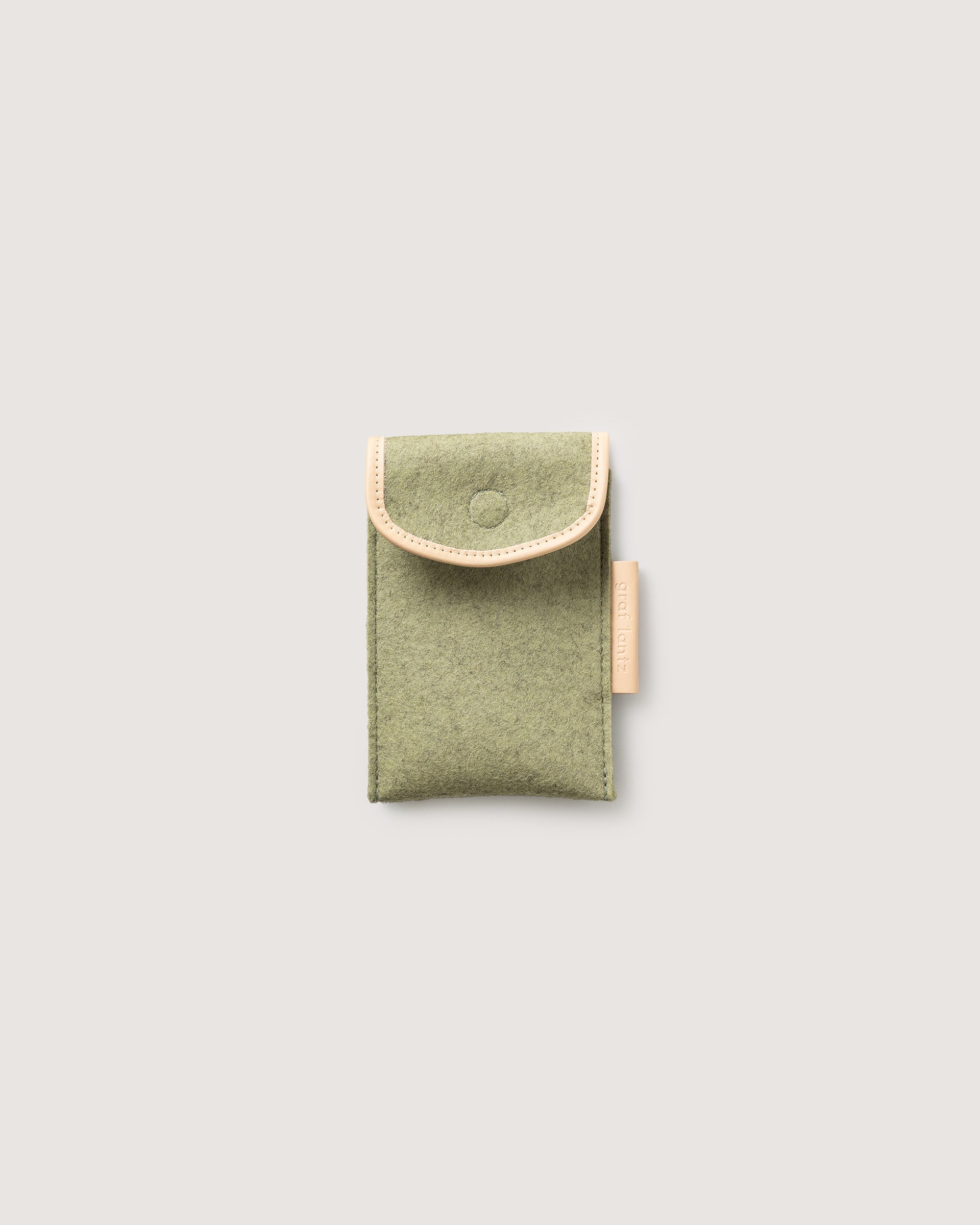 Protect your phone or other small items with our Envelope Accessory Sleeve. Here in sage color