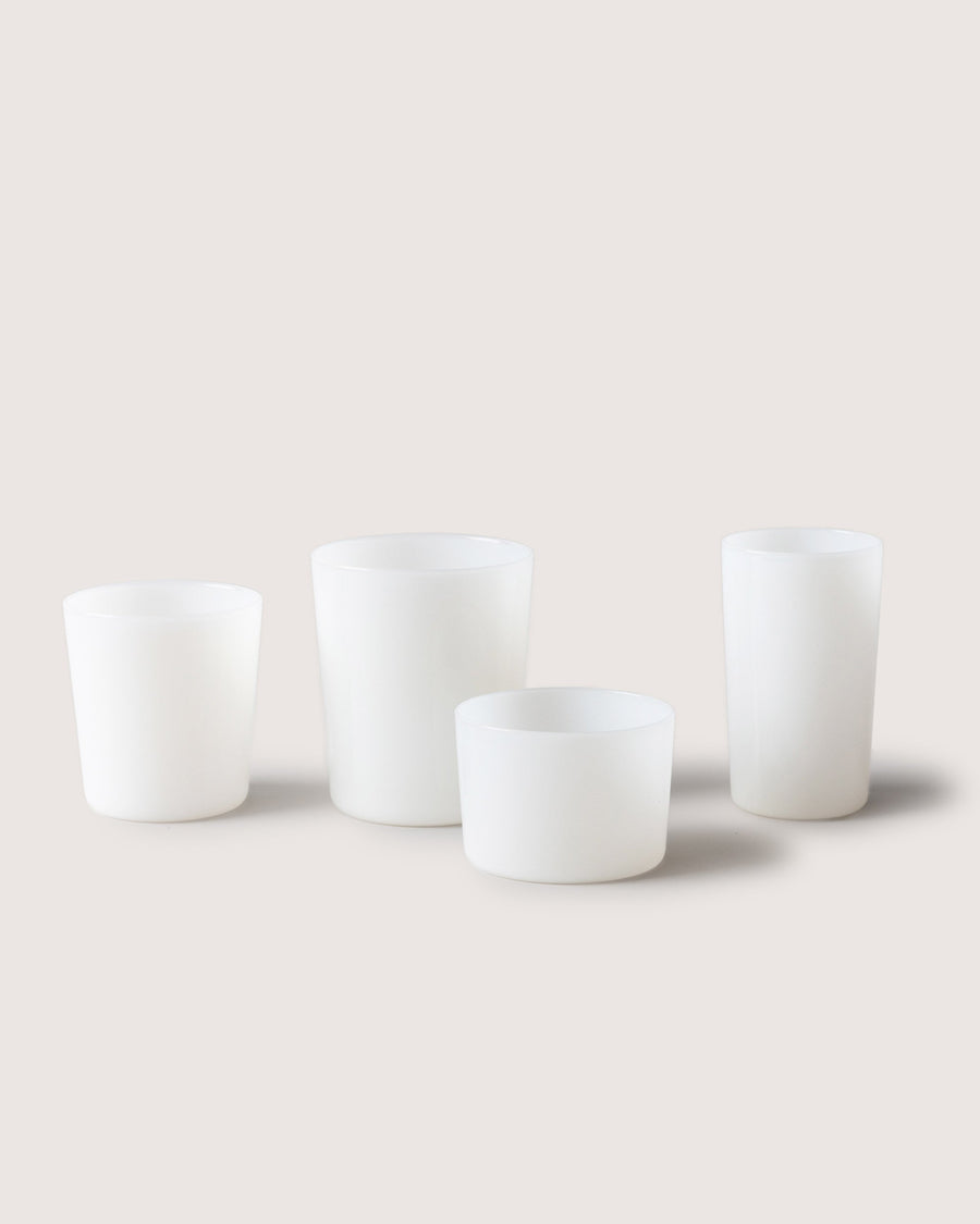 Selection of drinking glasses and a small bowl in color foam by Graf Lantz, white background