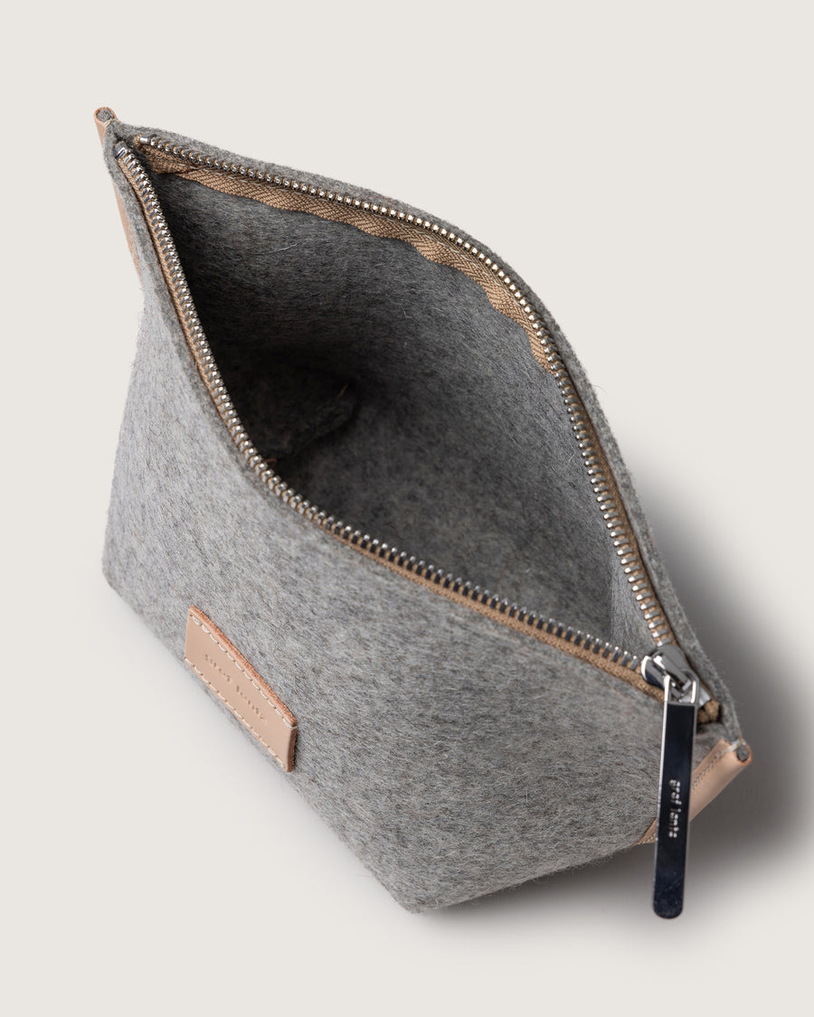 Interior view: Granite Hana Merino Wool Pouch Bag by Graf Lantz with open zipper,  white background