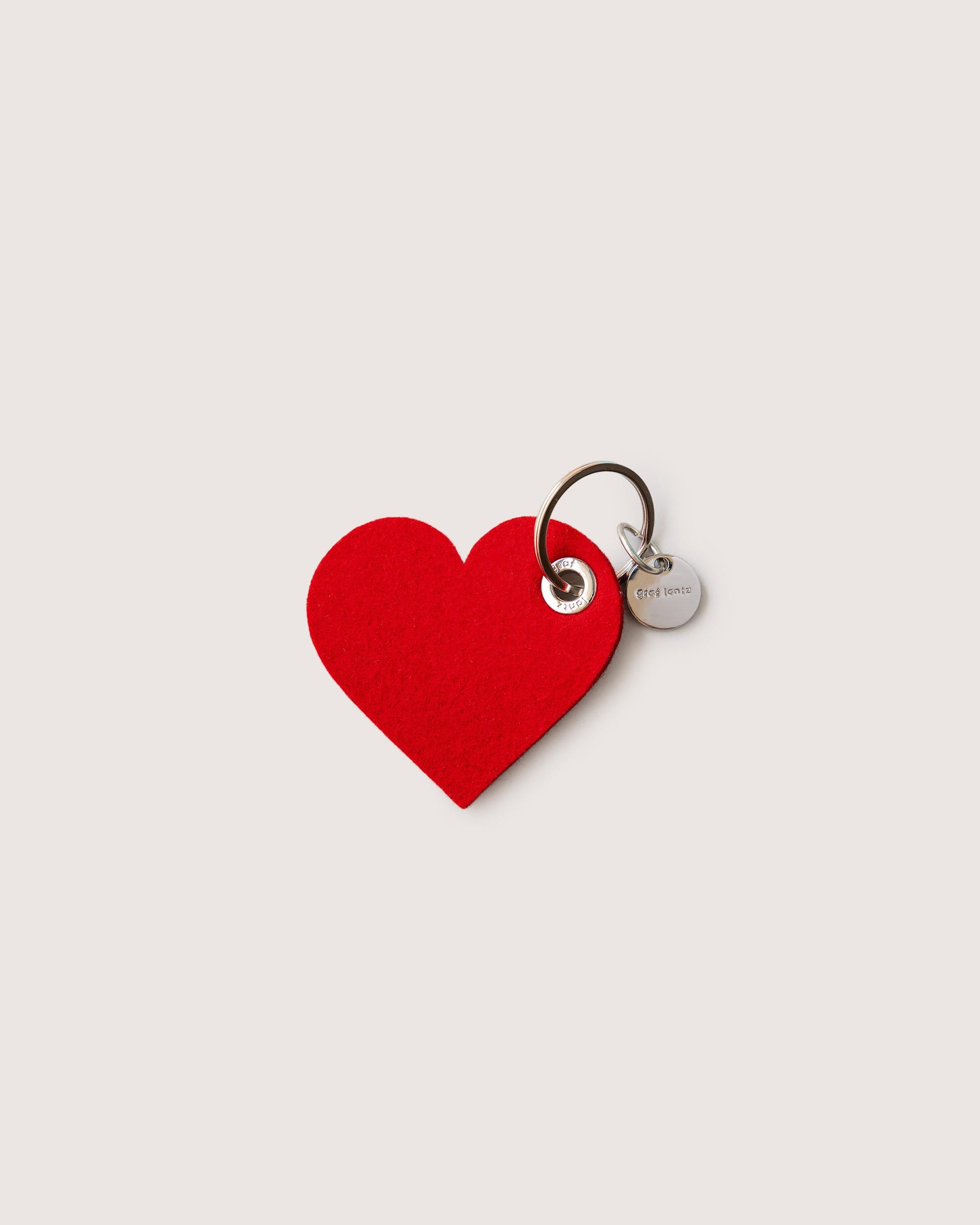A red Heart Merino Wool Felt Key Fob by Graf Lantz, front view