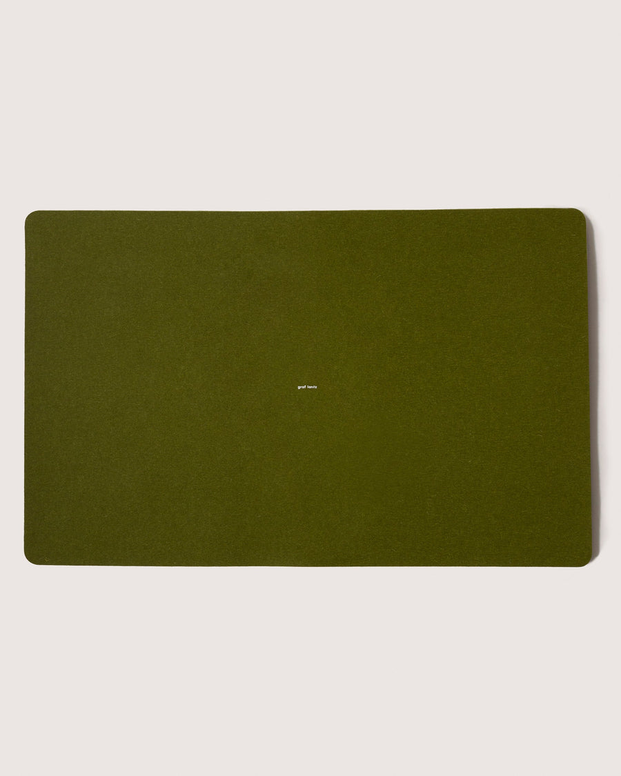 Mosen Merino Wool Large Desk Pad in Moss-green color with small white brand logo in the middle, white background