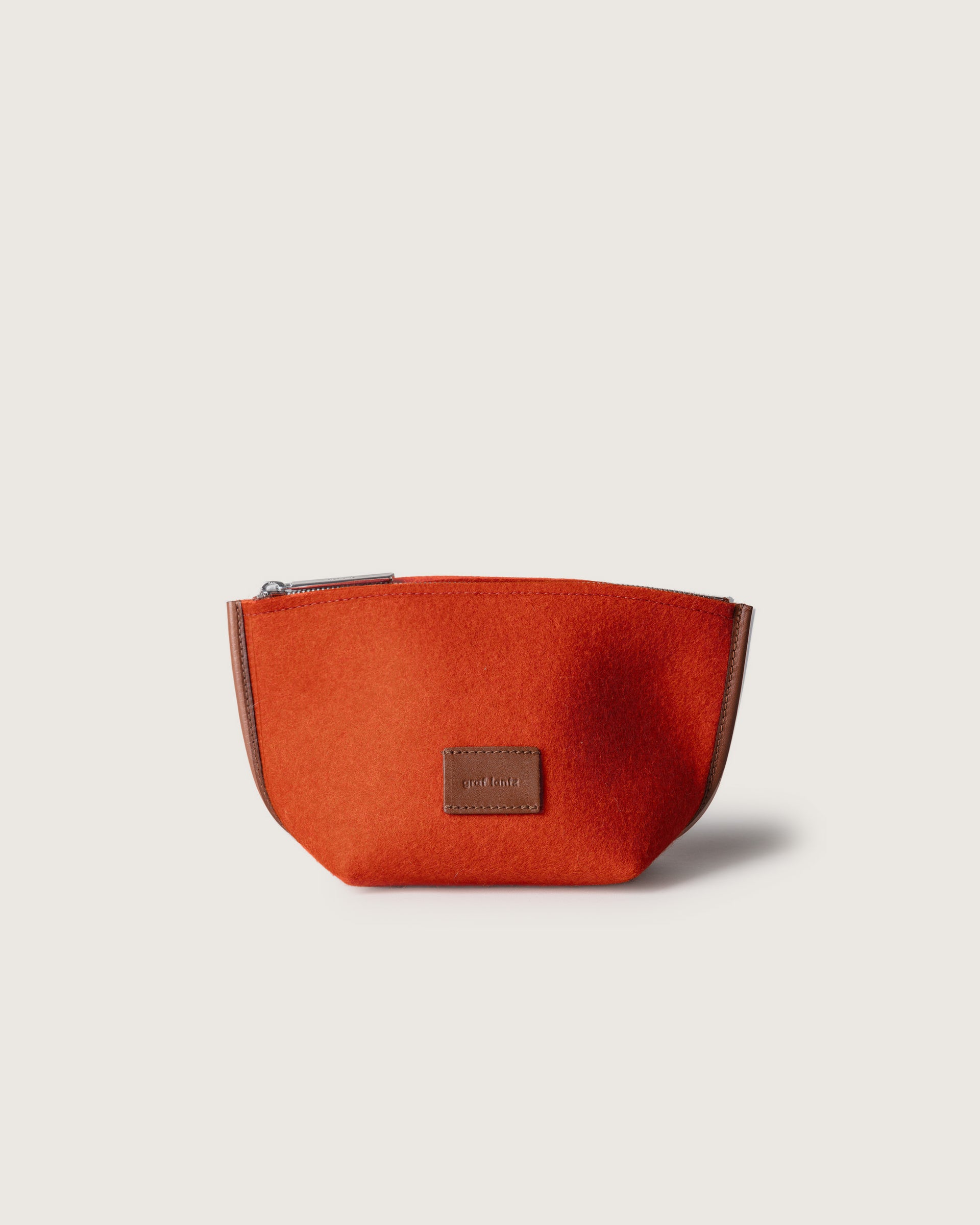 Orange Hana Merino Wool Pouch, front view, white background