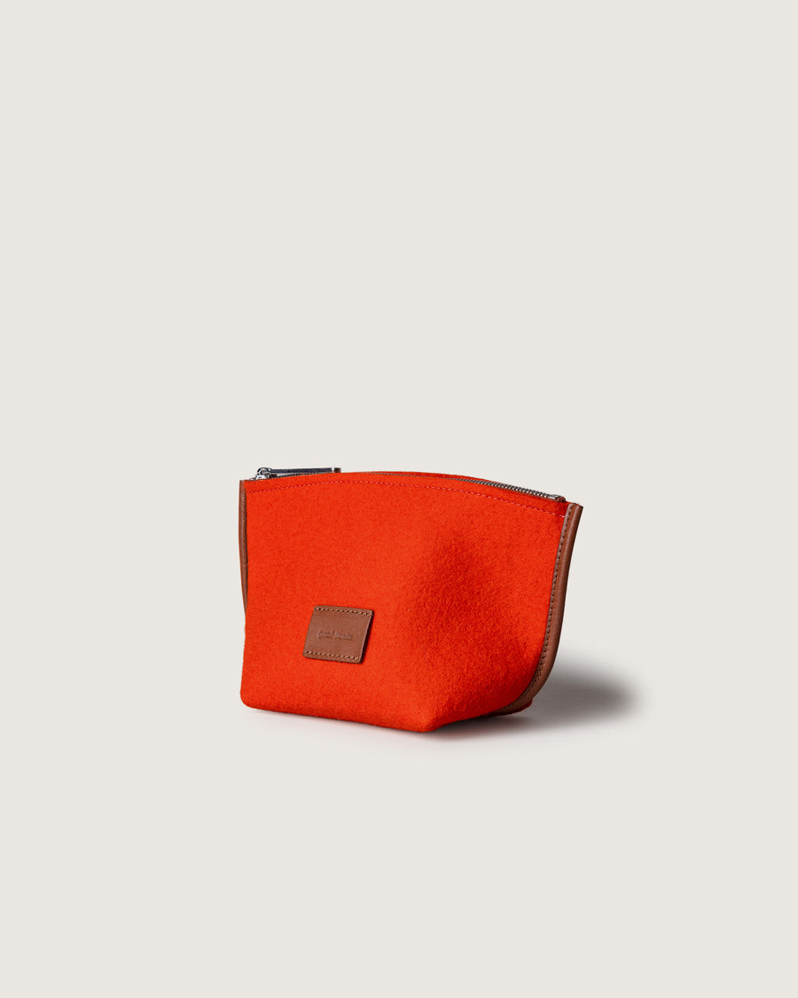 Orange Hana Merino Wool Pouch, side view, white background