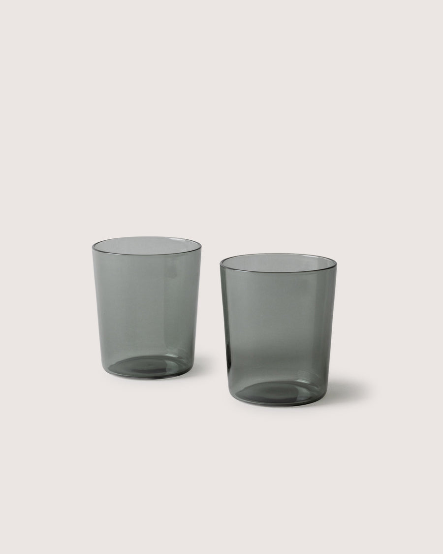 Two large Glas Tumbler in color smoke, white background