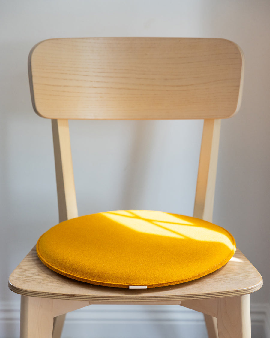 Round, plush, and sturdy:  Zabutons Seat Pads in a turmeric color