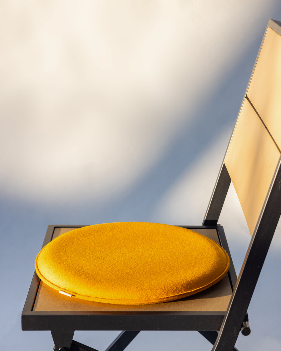 Round, plush, and sturdy:  Zabutons Seat Pads in a turmeric color